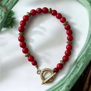 Elegant Red Beaded Bracelet with Gold Accents